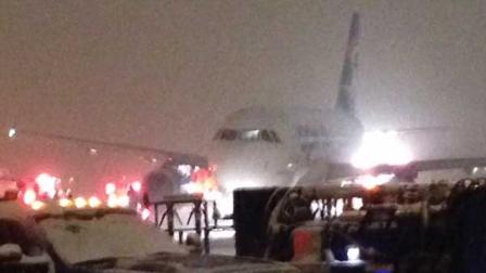 A Spirit Airlines plane slipped off a taxiway at OHare International Airport while taxiing to prepare for a flight to Las Vegas Sunday evening.