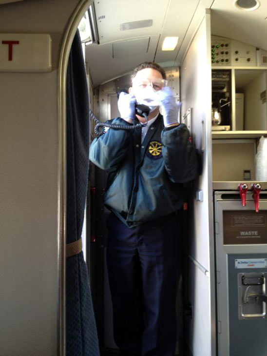 Fire and ambulance crews were on the runway at...