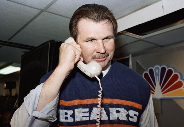 Chicago Bear head coach Mike Ditka, talks to...
