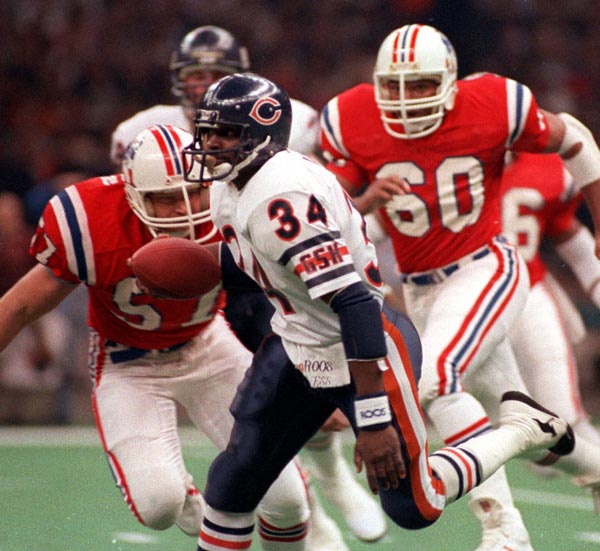 Chicago Bears' Walter Payton runs with the ball...