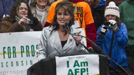 Former Alaska Gov. Sarah Palin speaks at a tax day tea party rally Saturday, April 16, 2011, in Madison, Wis.