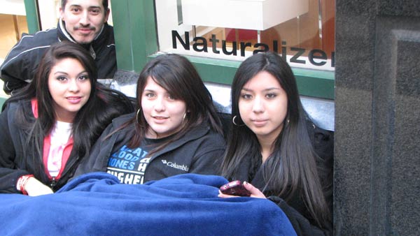 Dozens of teenage girls lined up at FYE in...