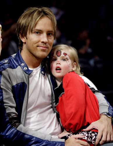 This campaign ad image provided by Guess? Inc.,...