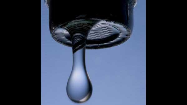 File photo of water coming out of a faucet. (AP Photo/Matt Rourke)