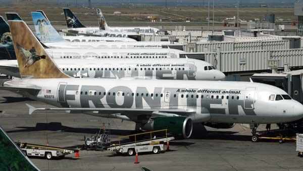 A long line of Frontier Airlines Airbus 319s sit at the gates on concourse A at Denver International Airport in this AP file photo. (AP Photo/David Zalubowski, FILE)