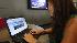 Having trouble getting online? It could be... :: In this Aug. 6, 2009 file photo, college student Joy Troy checks a twitter page at the Annenberg School of Communication department at the University of Southern California campus in Los Angeles. (AP Photo/Damian Dovarganes, File)