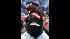 Charles Lim of New York City braves the weather...