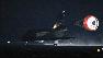 Space shuttle makes rare night landing