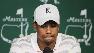 Two champs tee off Masters, focus still on Woods