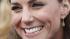 Kate Middleton reacts to the crowd, during a...