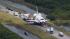 Space shuttle Atlantis is towed to the Orbitor...