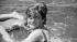 Mrs. Jacqueline Kennedy swimming in the...