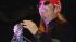 Entertainer Bret Michaels holds a handful of beads while riding in the Mardi Gras parade in New Orleans, Monday, Feb. 20, 2012. 