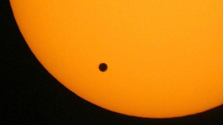 This June 8, 2004 file photo shows the transit of Venus, which occurs when the planet Venus passes between the Earth and the Sun, is pictured in Hong Kong. Venus will cross the face of the sun on Tuesday June 5, 2012, a sight that will be visible from parts of Earth. This is the last transit for more than 100 years.