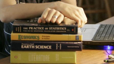 A high school students text books. (FILE)