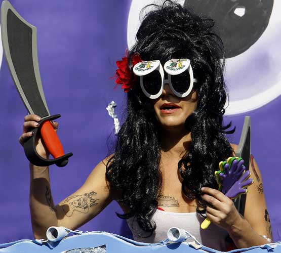 The Mardi Gras Krewe of Tucks parade drives...