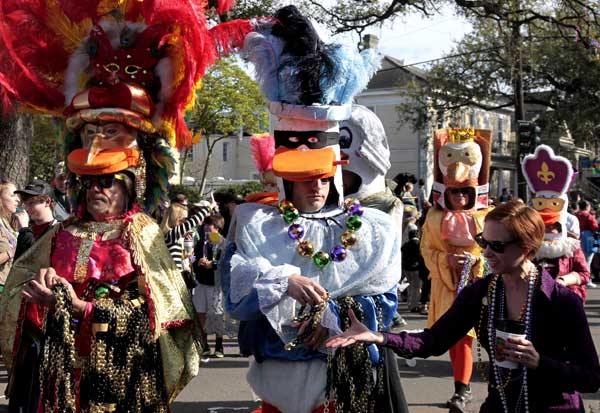 The Mardi Gras Krewe of Tucks parade drives...