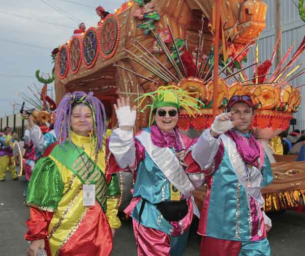 The Mardi Gras Krewe of Tucks parade drives...