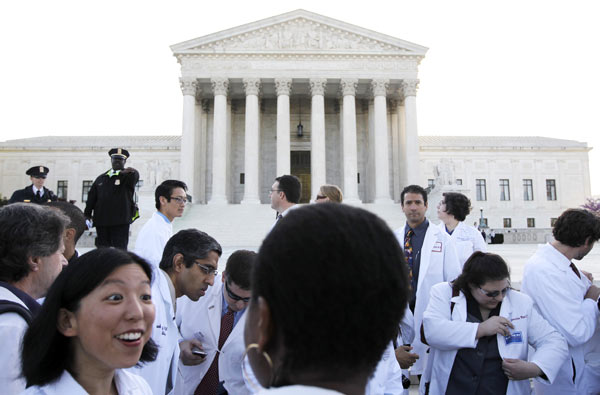 Doctors and medical students supporting the...