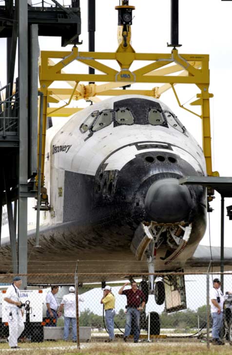 Space shuttle Discovery waits at the...