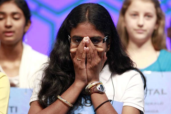 Snigdha Nandipati, 14, of San Diego, right, and...