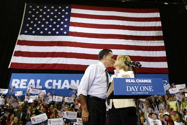 President Barack Obama points to singer Bruce...