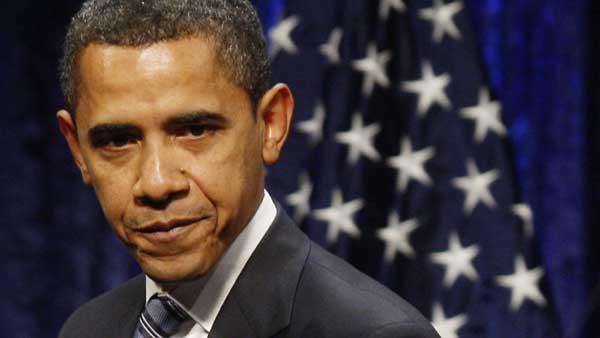 Then President-elect Barack Obama finishes speaking about the economy, Thursday, Jan. 8, 2009, at George Mason University in Fairfax, Va. (AP Photo/Charles Dharapak)