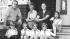 The George Ryan family sits on the porch of...