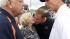 Illinois Gov. George Ryan, left, visits with...