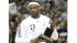Cleveland Cavaliers LeBron James holds the...