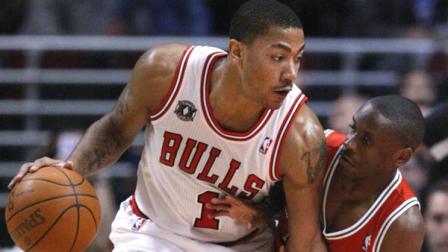 Chicago Bulls guard Derrick Rose, left, tries to drive on Milwaukee Bucks guard Earl Boykins during the first half of an NBA basketball game Monday, Jan. 24, 2011, in Chicago. (AP Photo/Charles Rex Arbogast)