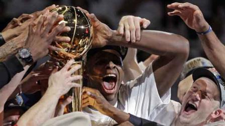 The Dallas Mavericks celebrate after Game 6 of the NBA Finals basketball game against the Miami Heat Sunday, June 12, 2011, in Miami. The Mavericks won 105-95 to win the series. 