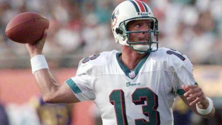 Miami Dolphins quarterback Dan Marino drops back in the pocket to throw a pass during the first quarter against the St. Louis Rams at Pro Player Stadium in Miami