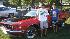 osh and Drew Sims with their parents' 1969 Ford Mustang Mach 1