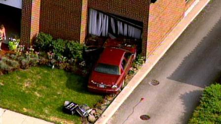 A driver somehow lost control of a vehicle in Villa Park, sending the car into the front of Inland Bank.  