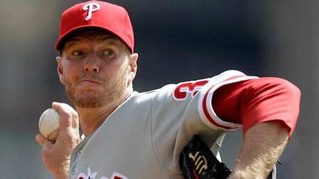 Philadelphia Phillies pitcher Roy Halladay throws during the first inning of the season opening baseball game against the Pittsburgh Pirates in Pittsburgh Thursday, April 5, 2012. The Phillies won the game 1-0.