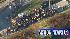The crowd of passengers walks away from the...
