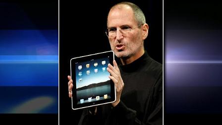 Apple CEO Steve Jobs shows off the new iPad during an event in San Francisco, Wednesday, Jan. 27, 2010. (AP Photo/Paul Sakuma)