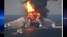 This image provided by the U.S. Coast Guard shows fire boat response crews battle the blazing remnants of the off shore oil  rig Deepwater Horizon Wednesday April 21, 2010. The Coast Guard by sea and air planned to search overnight for 11 workers missing since a thunderous explosion rocked an oil  drilling platform that continued to burn late Wednesday. 
