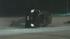 A car flipped onto its side along westbound...