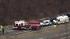 A firetruck blocks oncoming traffic in the...