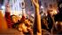 A large, jubilant crowd reacts to the news of...