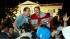 Crowds celebrate on Pennsylvania Avenue in front...