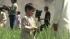 In other pictures from the scene, children can...