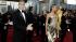 George Clooney and Stacy Keibler arrive before...