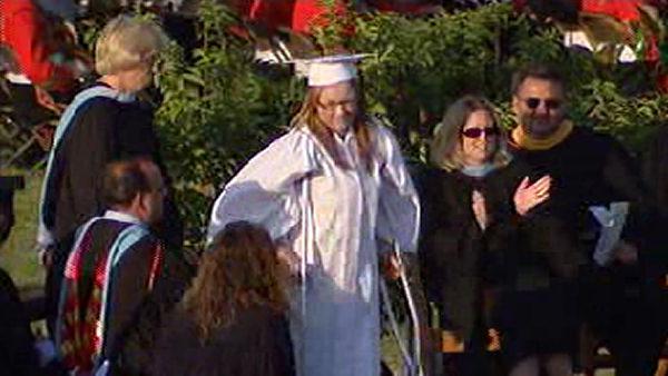 Ashley Zauflik receives an ovation from the crowd as she crosses the stage at the Pennsbury H.S. graduation.