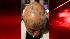 A New York Yankees fan shows off his head before...