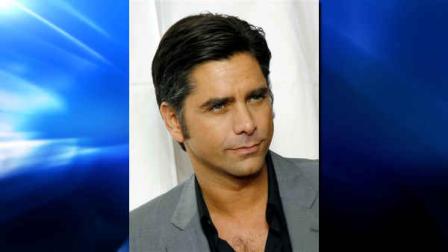 ** FILE ** In this Nov. 13, 2008 file photo, John Stamos arrives to the Broadway opening of Billy Elliot The Musical, in New York.