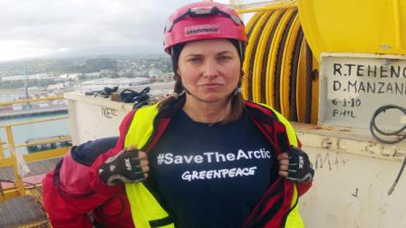 In this photo provided by Greenpeace, actress Lucy Lawless joins activists in stopping a Shell-contracted drillship from departing the port of Taranaki, New Zealand, Friday, Feb. 24, 2012. Lawless, a native New Zealander, best known for her title role in Xena: Warrior Princess, climbed the oil-drilling ship bound for the Arctic to try and stop it from leaving.
