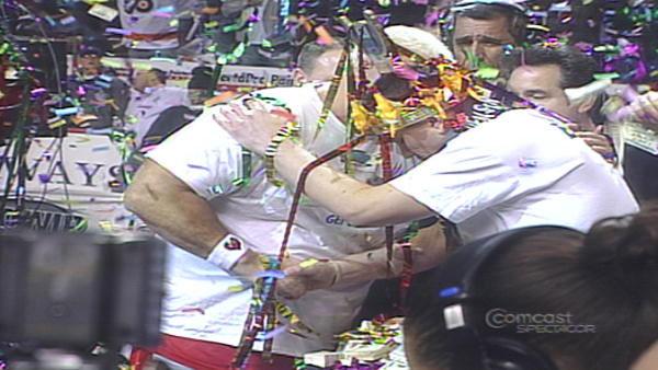 After it is announcd that Super Squibb eat 255 wings to defeat El Wingador and retain his title, the two competitors shake hands.
